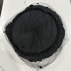 Vintage black hat with black netting